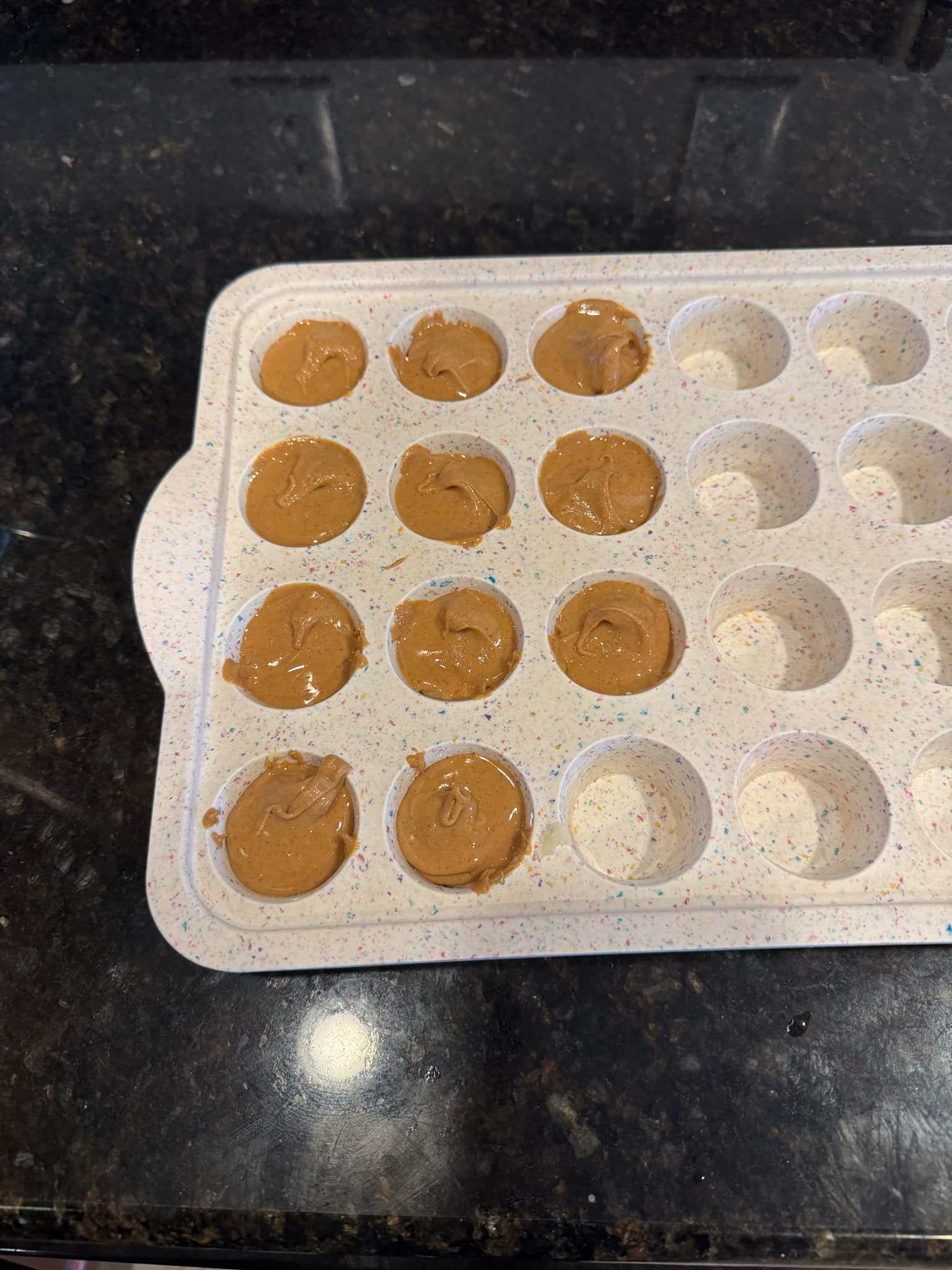 pour peanut butter over banana slices